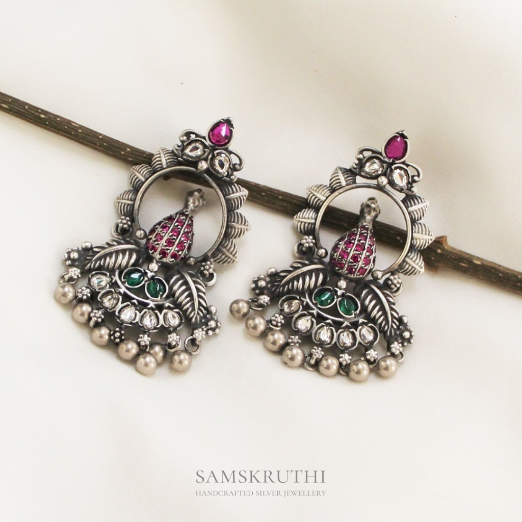 Dancing peacock earrings